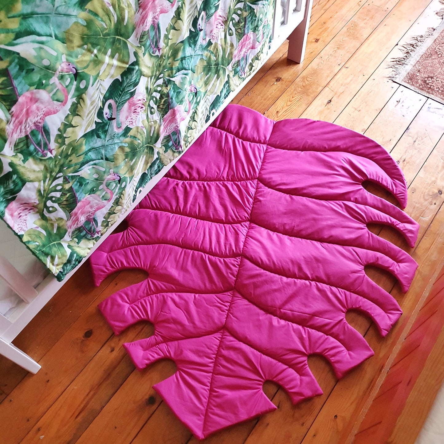 Bright pink Monstera rug Size M